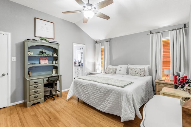 bedroom featuring ceiling fan, baseboards, lofted ceiling, and wood finished floors