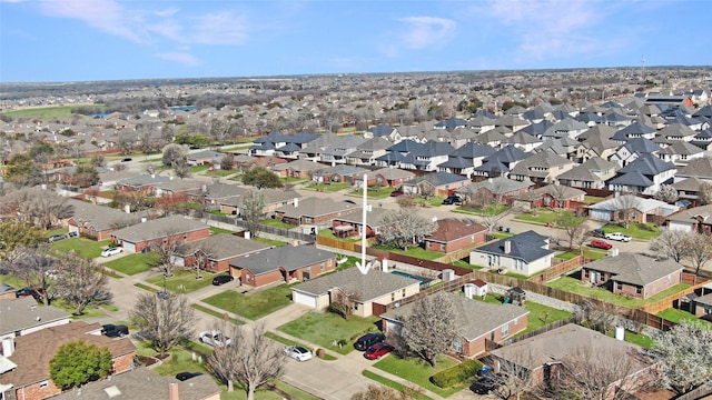 birds eye view of property with a residential view