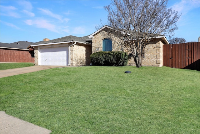 ranch-style home featuring a garage, a front lawn, concrete driveway, and brick siding