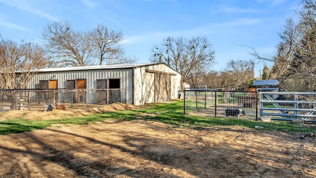 view of outbuilding featuring an exterior structure and an outbuilding