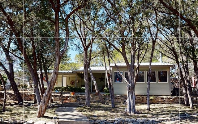 view of front of property with metal roof