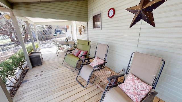deck featuring a ceiling fan