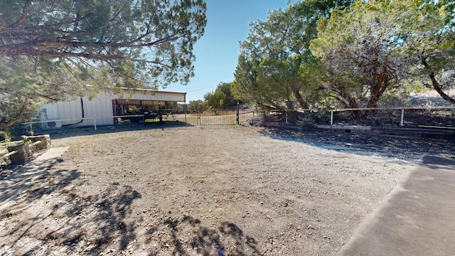 view of yard featuring an outbuilding and a pole building