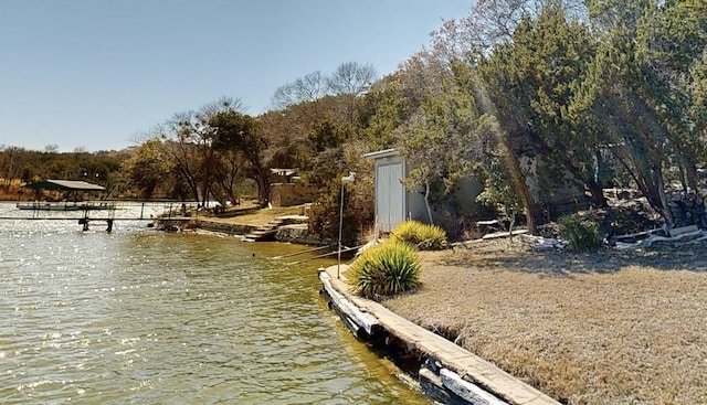 view of dock with a water view