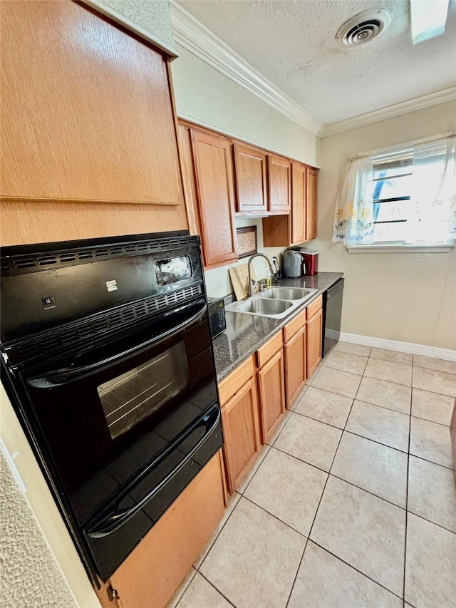 kitchen featuring light tile patterned floors, visible vents, ornamental molding, a sink, and black appliances