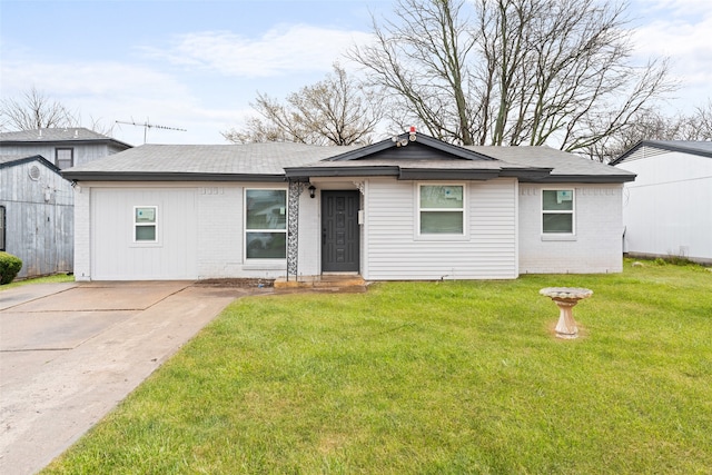 3814 Happy Canyon Dr, Dallas, TX 75241 - ranch-style house featuring a front lawn and brick siding