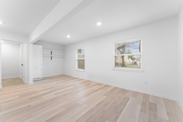 interior space with recessed lighting, baseboards, and light wood-type flooring