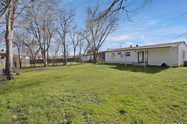 view of yard with fence