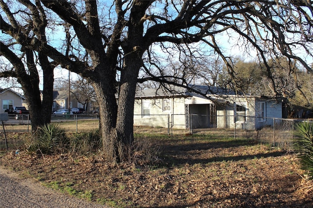 exterior space with a gate and fence