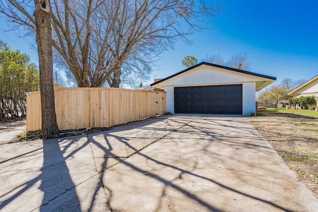 detached garage with fence