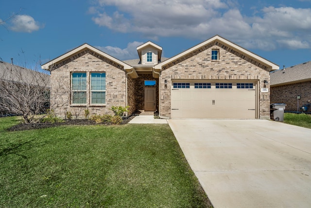 view of front of property with a front lawn, brick siding, an attached garage, and driveway