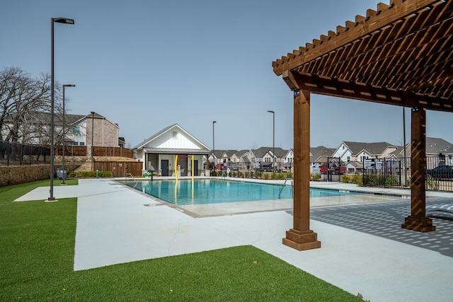 community pool featuring a patio area, fence, a residential view, and a pergola