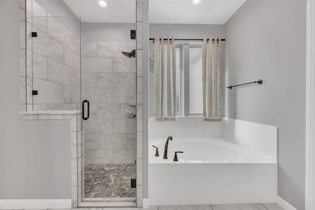 full bathroom with a bath, recessed lighting, a stall shower, and baseboards