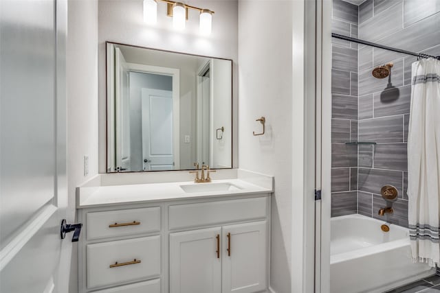 bathroom featuring shower / tub combo and vanity