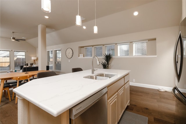 kitchen with lofted ceiling, dark wood-style flooring, a sink, appliances with stainless steel finishes, and open floor plan