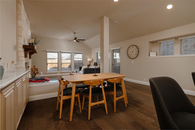 dining space featuring a ceiling fan, recessed lighting, baseboards, dark wood-style flooring, and vaulted ceiling