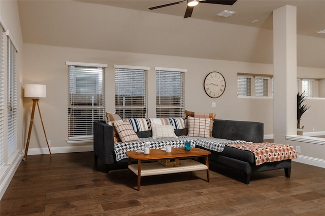 living area with wood finished floors, visible vents, baseboards, lofted ceiling, and ceiling fan