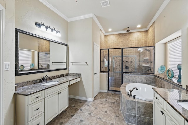 full bathroom featuring visible vents, ornamental molding, a stall shower, a bath, and a sink