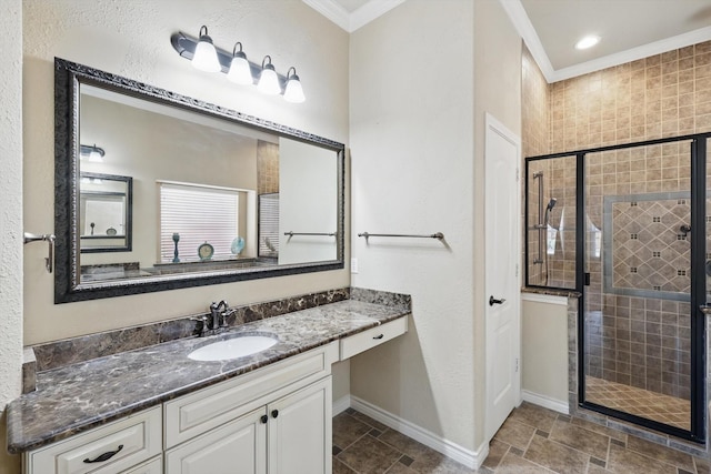 bathroom with a stall shower, baseboards, and ornamental molding