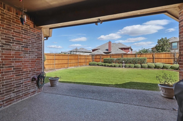 view of patio featuring a fenced backyard