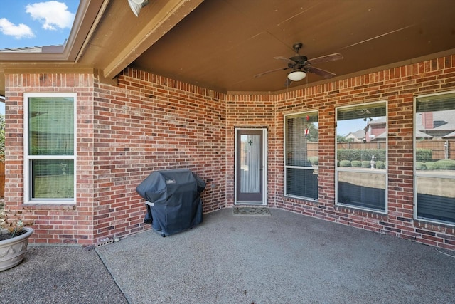 view of patio / terrace with a grill and ceiling fan