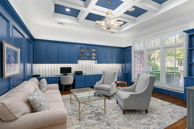 living room with beam ceiling, coffered ceiling, dark wood-style floors, a high ceiling, and built in study area