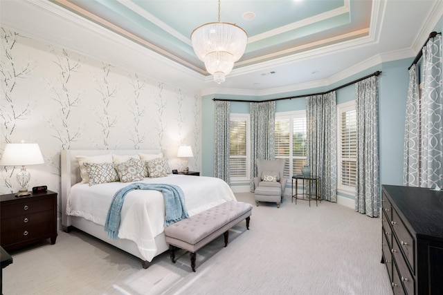 bedroom with wallpapered walls, crown molding, a chandelier, light carpet, and a raised ceiling