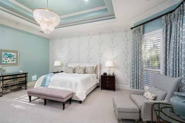 bedroom with wallpapered walls, a tray ceiling, a notable chandelier, and carpet flooring