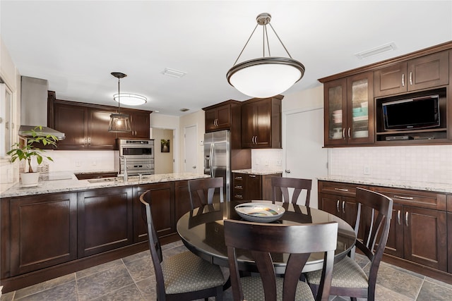 interior space featuring visible vents and stone finish floor