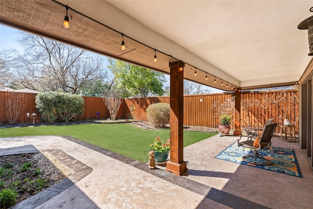 view of patio with a fenced backyard