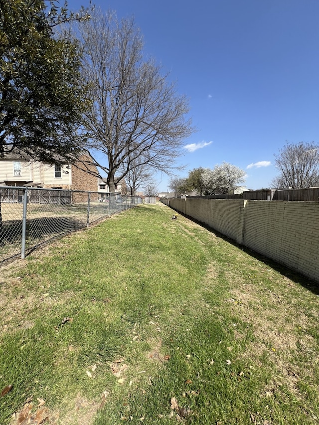 view of yard featuring a fenced backyard