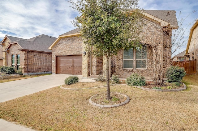 view of front of home with brick siding, concrete driveway, and a garage