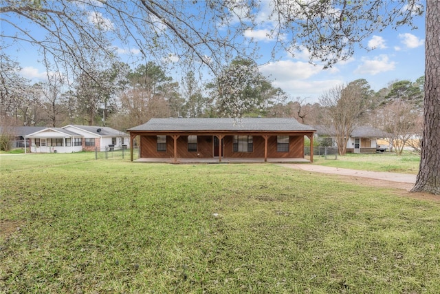 view of front of home with a front yard, a porch, and fence