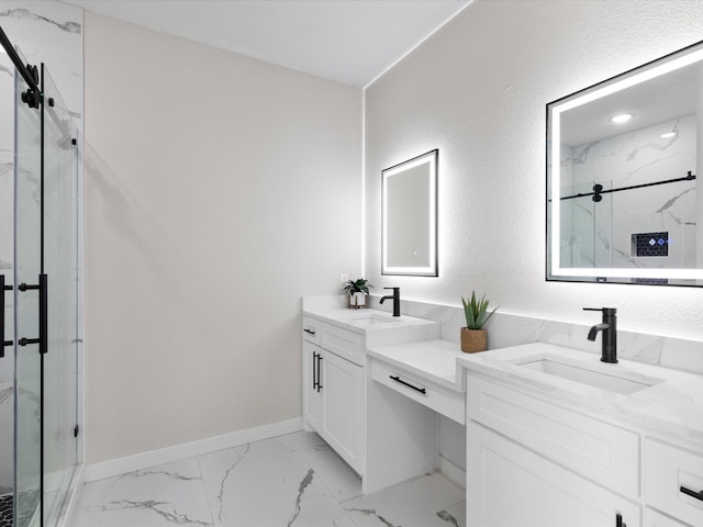 full bathroom featuring vanity, baseboards, marble finish floor, and a marble finish shower