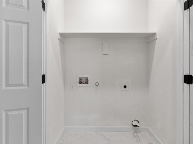 washroom with electric dryer hookup, marble finish floor, washer hookup, gas dryer hookup, and laundry area