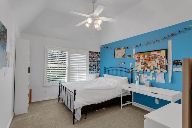 bedroom with vaulted ceiling, carpet, baseboards, and ceiling fan