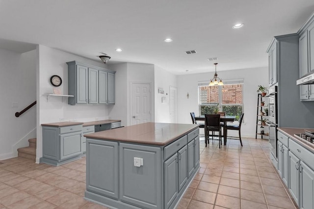 kitchen with open shelves, recessed lighting, visible vents, and gray cabinetry