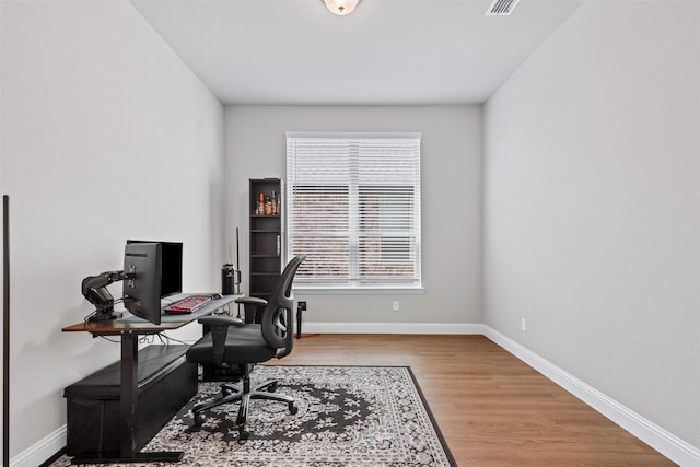 1504 Pleasant Knoll Trl, Aubrey, TX 76227 - office space with visible vents, baseboards, and wood finished floors