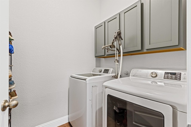1504 Pleasant Knoll Trl, Aubrey, TX 76227 - laundry room with baseboards, cabinet space, and independent washer and dryer