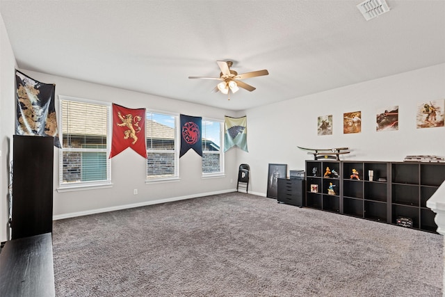 1504 Pleasant Knoll Trl, Aubrey, TX 76227 - interior space featuring a ceiling fan, baseboards, visible vents, and carpet floors