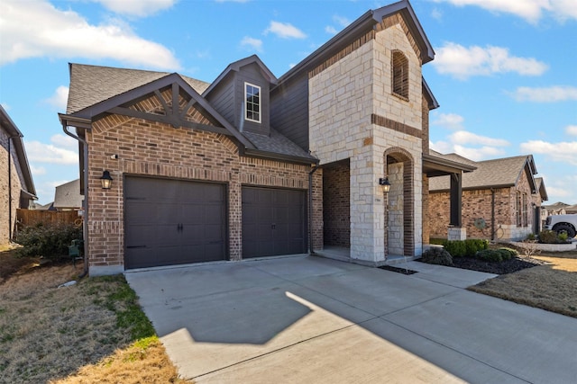 view of front of home featuring brick siding, an attached garage, a shingled roof, and driveway