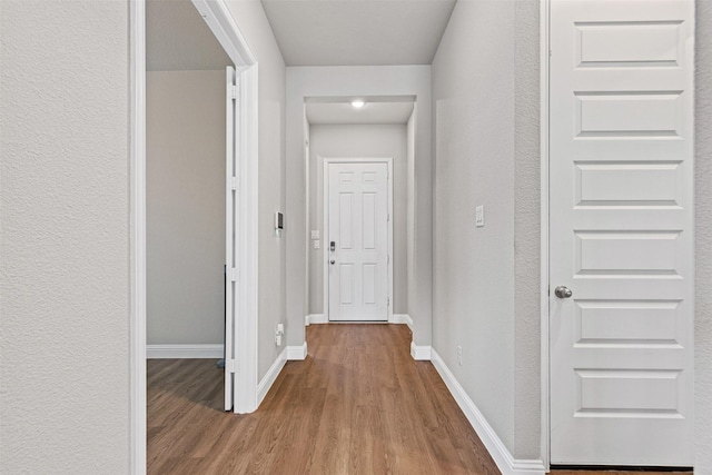 1504 Pleasant Knoll Trl, Aubrey, TX 76227 - hall with wood finished floors and baseboards
