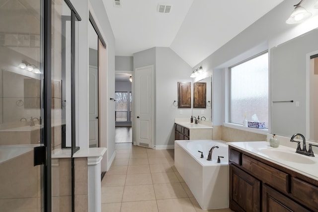 305 Dorset Ct, Roanoke, TX 76262 - bathroom featuring two vanities, a bath, a shower stall, tile patterned floors, and lofted ceiling