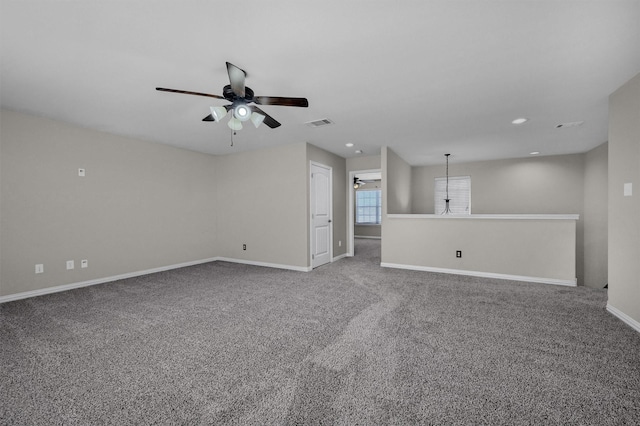 carpeted empty room with visible vents, recessed lighting, baseboards, and ceiling fan