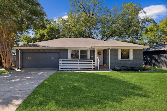 ranch-style home with brick siding, a garage, concrete driveway, and a front lawn