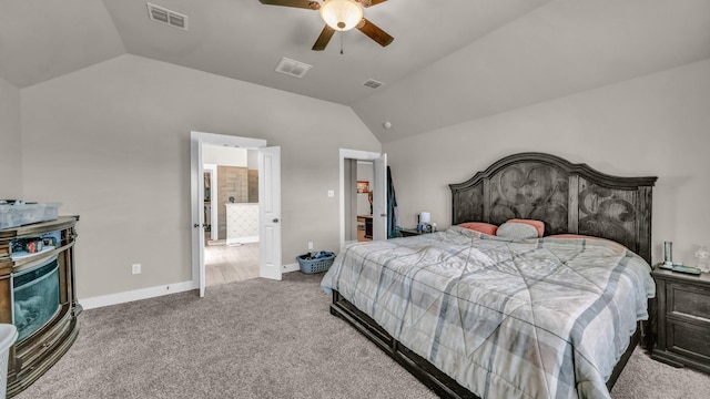 carpeted bedroom with visible vents, baseboards, and lofted ceiling