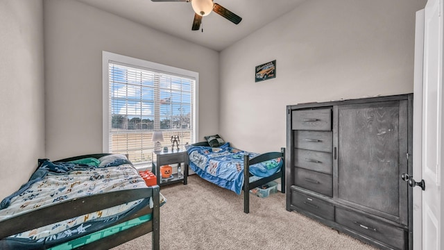 bedroom featuring carpet and a ceiling fan