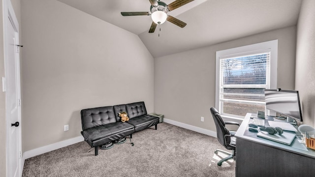 home office featuring baseboards, lofted ceiling, carpet, and a ceiling fan