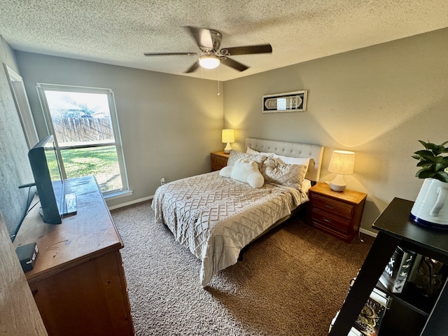 bedroom with a textured ceiling, a ceiling fan, baseboards, and carpet floors