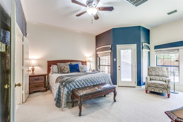 carpeted bedroom with access to exterior, visible vents, and multiple windows